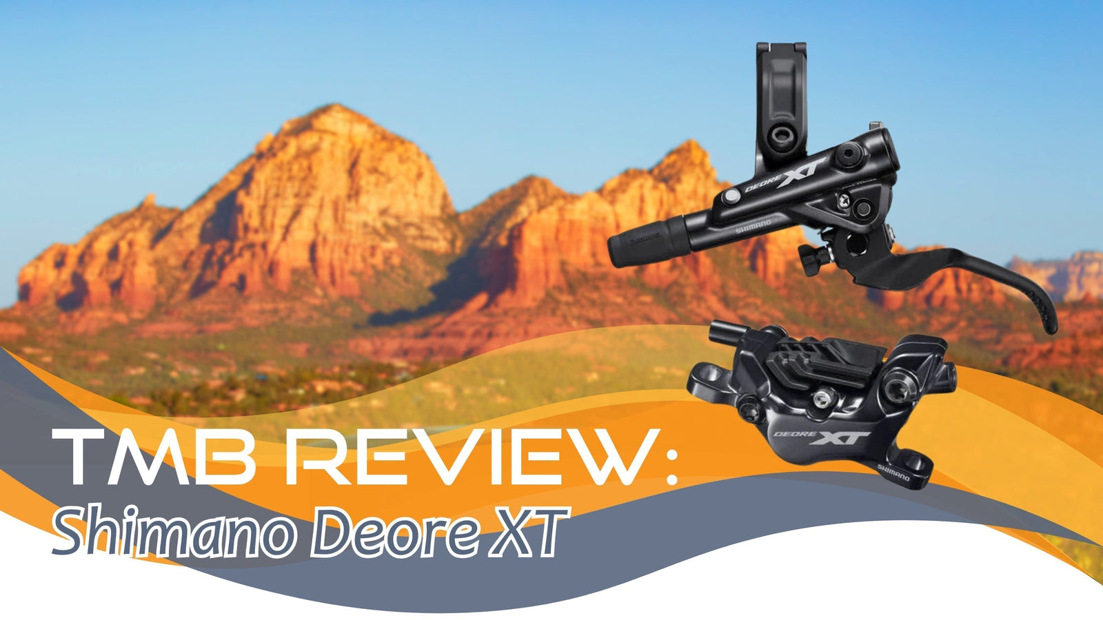 Shimano Deore XT mountain bike brake lever and caliper against Sedona red rock backdrop