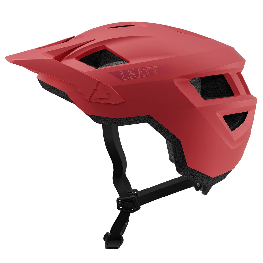 Red helmet with black straps on a white background