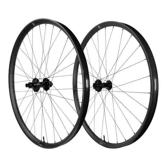Black mountain bike wheelset with sleek rims and durable spokes for trail riding