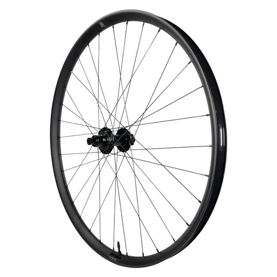 Black mountain bike wheel with Sector hub and sleek rim design for trail riding