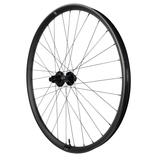 Black mountain bike wheel with TRIO rim and disc hub, ideal for trail riding and bike upgrades